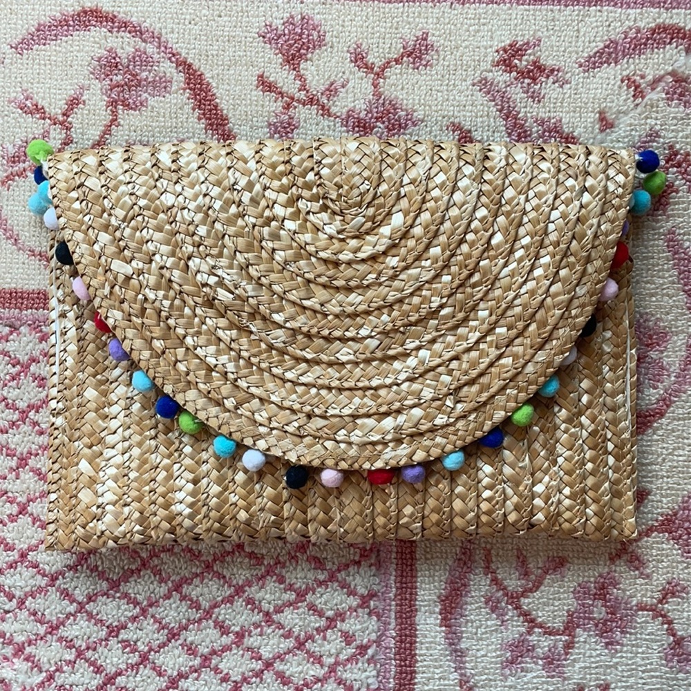 Beautiful clutch with poms